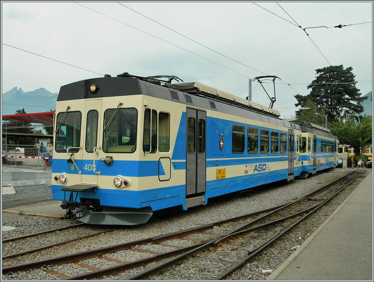 Der BDe 4/4 403 und ein weitere BDe 4/4 in Aigle, im Hintergrund ist mit etwas gutem Willen der A-L Zug zu erkennen.
14. Sept. 2006
