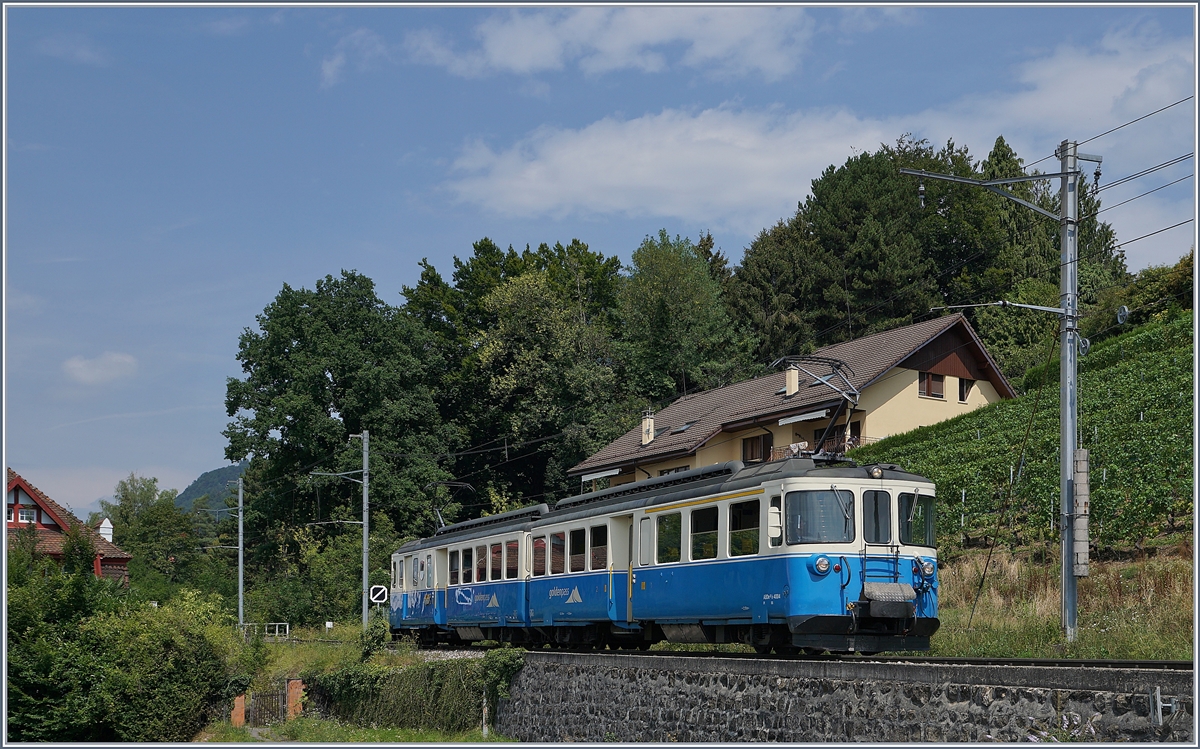 Der MOB ABDe 8/8  Fribourg  auf seiner Fahrt Richtung Montreux kurz vor Planchamp.
8. August 2018