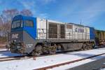 OHE 1041 steht mit einen leeren Holzzug im Bahnhof Munster (07.03.10)