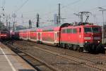 111 077-9 am RE 9 nach Siegen am 04.03.2011 in K�ln Messe/Deutz 