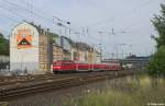 111 128-5 mit dem RE 10424 von Dortmund nach Aachen am 25.09.2013 bei der Einfahrt in den Bahnhof Wuppertal-Oberbarmen.