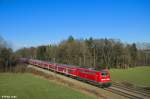 111 021-2 und 111 005-5 mit dem M79021 (München - Salzburg) am 28.12.2013 bei Gutmart.