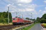112 172-2 mit dem RE 21023 (Kiel Hbf - HH-Altona) am 28.07.2014 bei Brokstedt.