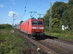 145 031-1 in Bonn-Oberkassel mit einem Containerzug.