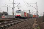186 107 mit Containerzug  am ehem.