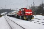 G 1000BB (DH 49) von der HGK mit einem Gifftzug in K�ln-West am 27.12.2010.