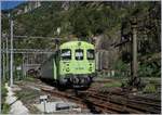 Der BLS Tunnelautozug nach Brig verschwindet in Iselle im 169 Meter langen  Tunnel von Iselle , am Schluss des Zuges ein BLS Steuerwagen .